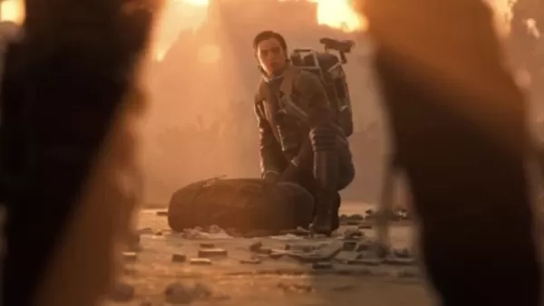 Personnage d'ARC Raiders accroupi à côté de son équipement